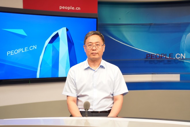 中國藝術研究院院長、黨委副書記周慶富做客人民網。張力洋攝